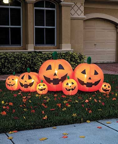 "Grow" an instant pumpkin patch in your yard with this 8' inflatable. Easy to set up, it features seven jack-o'-lantern pumpkins in various sizes Dekorasi Halloween, Inflatable Pumpkin, Pumpkin Family, Labu Halloween, Halloween Inflatables, Halloween Outdoor, Halloween Yard Decorations, Pumpkin Lights, Halloween Yard