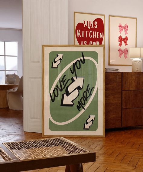 ♥️🃏 "Love You More" Green Retro Wall Art - A Playful and Loving Touch for Your Space 🃏♥️ Bring a touch of nostalgia and affection to your home with our "Love You More" green Retro Wall Art! This unique design, inspired by the iconic  pink Uno card, features the heartfelt message "Love You More" in a playful and stylish typography. Perfect for adding a splash of color and love to any room, this print is a must-have for those who appreciate fun and trendy decor. As part of our Playing Card Wall Love You More Wall Decor, Self Made Art Wall, Couples Decor Ideas, Art For My Wall, Apartment Decor Unique, Eclectic Wall Decor Ideas, Wall Art Inspiration Living Room, Cool Art For Wall, Abstract Wall Prints