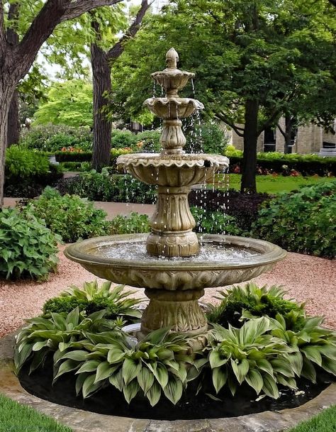 Add a Touch of Elegance with a Fountain Fountain Filled With Flowers, Savannah Courtyard Gardens, Water Fountain In Front Of House, Front Yard Fountain Landscaping, Garden Features Focal Points, Small Garden Fountain Ideas, Backyard With Water Feature, Waterfall Garden Ideas, Outdoor Fountains Landscape