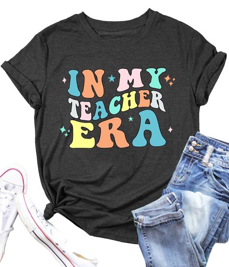 PRICES MAY VARY. ✿Outstanding Design : Teach t shirt for women, unique teacher graphic tee tops, inspirational teacher shirt, ladies casual loose fit short sleve top, classic round neck design suit for your besties, mom, classmate, friends or sister. ✿Excellent Gift : Our womens in my teacher ear letter print tshirt is an ideal gift for your choose, show you passion or support for teaching with this shirts, whenever high school techers, kindergarten teacher, elementary school teacher or who beco Neck Design Suit, Skirts Jeans, Leggings Shorts, My Teacher, Kindergarten Teacher, Shorts Skirts, Teacher Ideas, Shirts Women, Kindergarten Teachers