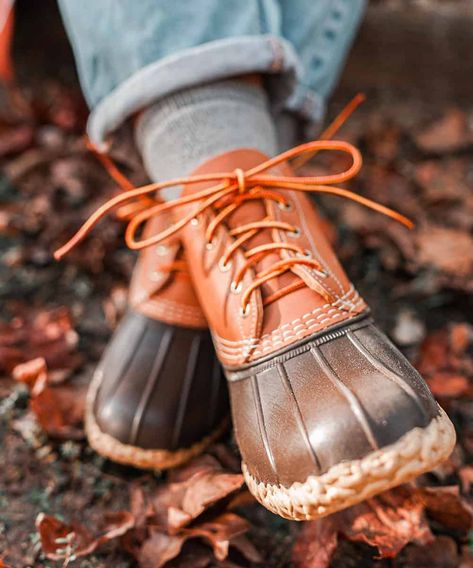 A pair of men's made in the USA L.L.Bean duck boots worn on feet with light wash denim. This image was included in the article: 15 Brands Making High Quality Shoes & Boots In The USA, on MensFlair.com Danner Bull Run, Chippewa Boots, Adventure Sandals, Square Toe Cowboy Boots, Usa Shoes, Moc Toe Boots, Leather Work Boots, Handmade Boot, Bean Boots