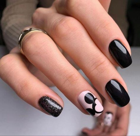 30 Disney-Inspired Nail Looks That Are Perfect For Hitting The Parks - 202 Black Nails With Mickey Mouse, Mickey Mouse Manicure Ideas, Disney Nail Designs Black, Mickey Nail Art Simple, Disney 100 Years Of Wonder Nails, Black Mickey Mouse Nails, Black Mickey Nails, Disney Nails Black, Black And White Disney Nails