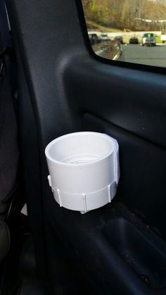 this is a simple cup holder for the back seat of your car. made easy in only a few minutes Diy Car Cup Holders, Cup Holder Ideas Cars, Cup Holder Diy, Cup Holder For Car, Diy Projects Using Pvc Pipe, Car Drink Holder, Diy Phone Stand, Truck Organization, Cup Diy