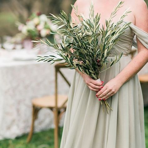 Bridesmaids wearing a sage coloured dress and olive branch bouquet Bridesmaid Simple, Olive Branch Wedding, Simple Bouquet, Olive Green Weddings, Greenery Wedding Bouquet, Olive Wedding, Timeless Wedding Dress, Green Wedding Colors, Olive Branches