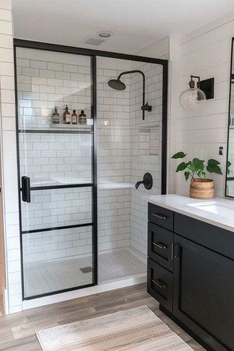 Walk In Shower Ideas Black And White, Black White Boho Bathroom, Black And White Industrial Bathroom, Modern Black And White Bathroom Design, Interesting Bathroom Design, Black And White Bathroom Cabinets, Modern White And Black Bathroom, White Subway Tile With Black Grout Bathroom, White Tile Black Grout Shower Ideas