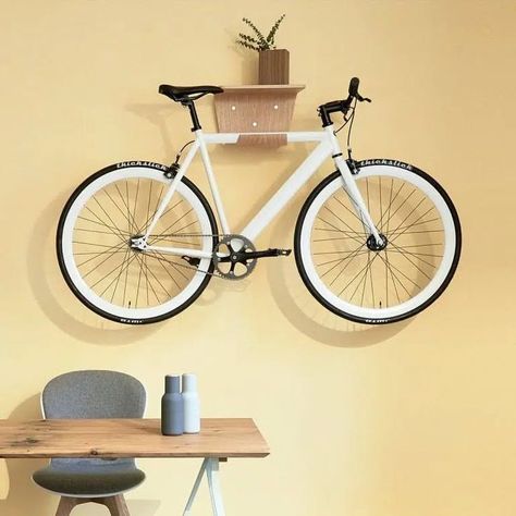 Designed with simplicity in mind, this bike rack features clean lines and simplicity, ideal for modern interiors. Image credit: INSTAGRAM @B_CAUSE.MAG Indoor Bike Storage Small Spaces, Bike Storage Small Space, Kids Bike Storage, Bike Storage Apartment, Bicycle Storage Rack, Indoor Bike Rack, Indoor Bike Storage, Bicycle Hanger, Outdoor Bike Storage