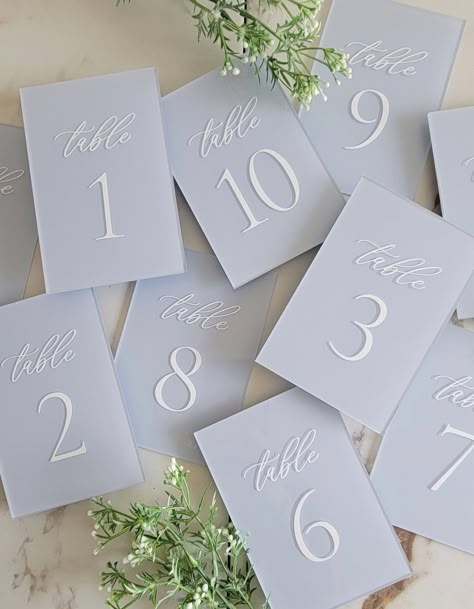 "This listing is for one table number. Select the total amount of table numbers you will need in the quantity dropdown. For example if you select 10, you will receive numbers 1-10. All of our acrylic wedding signs include are printed with our signature calligraphy with a painted background of your choice. * D E T A I L S * -Dimensions: 4x6\" acrylic table number -Choose your background color, style and font colors at checkout * S H I P P I N G * -Please allow up to 5 weeks for your order to be processed before shipping. If you need an item sooner, please reach out to us before ordering to ensure we can meet your need by date. -We package each order with care to ensure it gets to you as safe as possible. In the event that your order arrives damages, please reach out to us as soon as possibl Table Cards For Wedding, Table Seating Sign, Reception Table Numbers, Linen Table Numbers, Table Numbers Wedding Acrylic, Table Numbers Acrylic, Table Number Tags Wedding, Modern Table Numbers Wedding, Garden Wedding Table Numbers