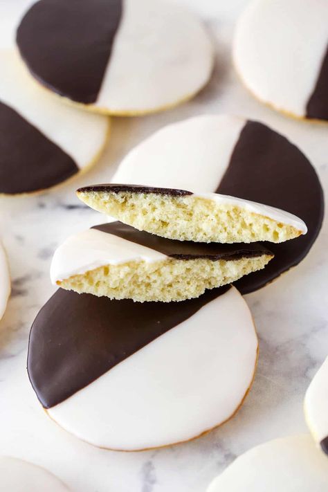 Enjoy this classic New York cookie no matter where you are in the world. Black and white cookies are soft, cakey vanilla cookies topped with both "black" (chocolate) and white icing. Tres elegant! Half Moon Cookies, New York Cookies, Empire Cookie, Moon Cookies, Flavored Coffee Creamer, White Cookies, Best Holiday Cookies, Black And White Cookies, I'm Fat