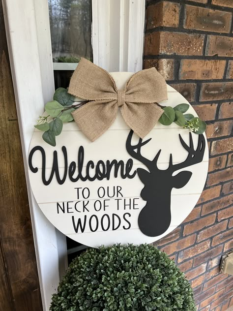 "Welcome to our Neck of the Wood Sign, Welcome Door Sign, Deer Sign, Welcome Sign, Country Sign, Neck of the Wood Sign, Farmhouse Door Sign Welcome to our Neck of the wood makes a perfect door or porch welcome Sign.  This sign is available in two size options. 11\" - Comes with burlap bow and twine for hanging 21\" - Comes with burlap bow, greenery, and twine for hanging. Thank you so much for choosing to shop small.  I truly appreciate it." Western Door Hangers Wood Signs, Cricut Crafts To Sell, Welcome Door Sign, Deer Signs, Hanger Ideas, Welcome Signs Front Door, Western Bedroom, Farmhouse Door, Door Hangers Diy