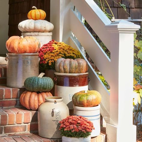 Flat pumpkins displayed in vintage crocks Crock Decor, Spooky Outdoor Halloween Decor, Vintage Crocks, Fall Crafts For Adults, Brick Steps, Outdoor Halloween Decorations, Halloween Diy Outdoor, Vintage Crock, Easy Diy Halloween Decorations