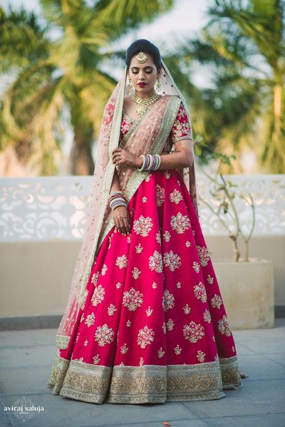 Bridal Lehengas - Coral Wedding Lehenga with Double Net Peach and Geen Dupatta | WedMeGood  #wedmegood #indianbride #indianwedding #lehenga #coral #bridal Red And Pink Combination, Baby Pink Lehenga, Dupatta Draping Styles, Pink Bridal Lehenga, Pink Combination, Sabyasachi Bridal, How To Dress For A Wedding, Lehenga Dupatta, Sabyasachi Lehenga