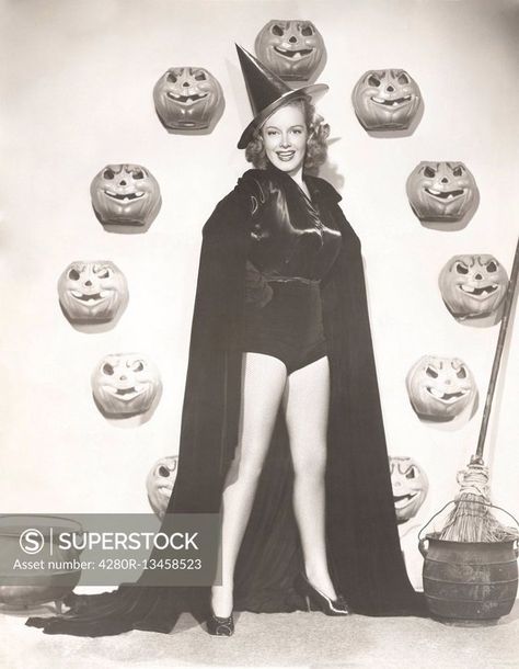 Superstock offers millions of photos, videos, and stock assets to creatives around the world. This image of Woman in witch costume surrounded by carved pumpkins by Old Visuals/Everett Collection,Old Visuals is available for licensing today. Witch Party Costume, Green Wedding Shoes Bride, Vintage Witch Costume, Carved Pumpkins, Witch Costumes, Clever Halloween Costumes, Vintage Halloween Costume, Photo Woman, Vintage Witch