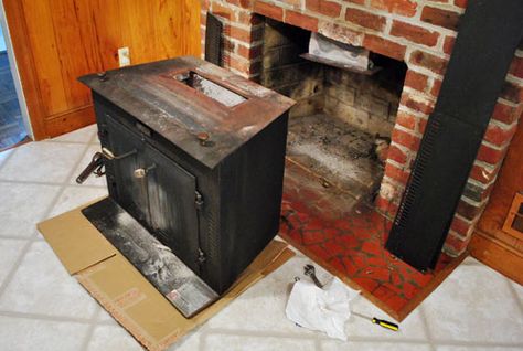 Young House Love | The Beginning Of A Fireplace Makeover: Removing A Woodstove Insert Fixer Upper Fireplace, Wood Burning Fireplace Inserts, Masonry Fireplace, Fireplace Cover, Build A Fireplace, Brick Fireplace Makeover, Paint Fireplace, Young House, Old Fireplace