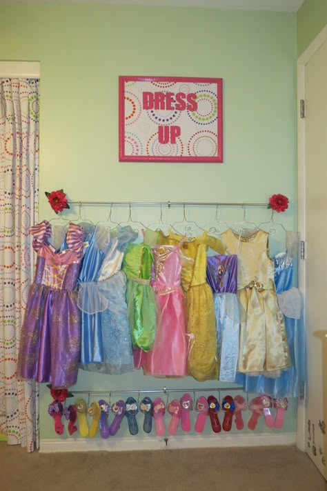 Hanging Dress Up Clothes On Wall, Dress Up Storage Behind Door, Hang Princess Dresses, Dress Up Wall Ideas, Princess Dress Organization, Bedroom Door Ideas, Kids Shoe Rack, Dress Up Corner, Dress Up Area