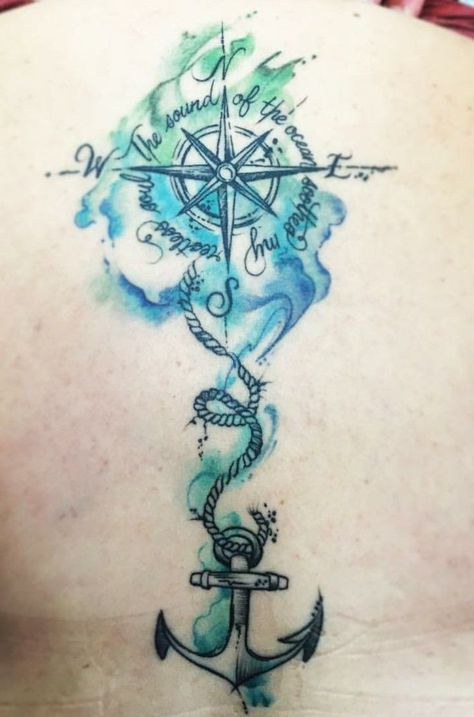 Awesome back tattoo for the ocean lover. I like the styling of the compass rose but almost wonder if the rope and anchor where added at a later date. Either way it makes a nice cohesive piece of art especially with the watercolor bringing it together. #ink #tattoo #tattooideas #nauticaltattoo #compassrosetattoo #anchortattoo #inspirationalquotetattoo #backtattoo #sidetattoo #beach #ocean #nautical Black Anchor Tattoo, Steve Tattoo, Watercolor Compass Tattoo, Nautical Compass Tattoo, Compass Rose Tattoo, Anchor Tattoo Design, Anker Tattoo, Compass Tattoo Design, Anchor Tattoos