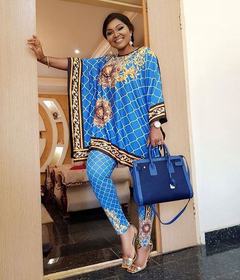 Belle @realmercyaigbe . . Outfit from@mag_divas . . Follow @fabfashafric for more . . Tag a friend . .  #africanfashion #africa #fabfashafric#africanweddings #fashionblogger  #asoebi#naijaweddings  #africanfashiontrends#arewawedding #africanstyle #asoebibella#photooftheday #ghanawedding #nigerianweddings#ankarastyles  #nigerianweddings #ankarastylesafrica#abujaweddings  #lagosweddings #africanprint#strongwomen #nollywood #gelestyle #asooekeandbeads #eugvic19 #eugvic2019 #Ghana #celebrities Dashiki Fashion, Casual Shorts Men, Mens Fashion Sweaters, Afrikaanse Mode, African Dashiki, Solid Color Sweater, Printed Casual Dresses, Vintage Trousers, Two Piece Pants Set