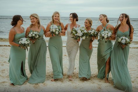 Bridesmaids light green color wedding dresses same color different style walking down the beach having fun time with gorgeous bride at #royaltonrivieramaya Small Beach Wedding Bridesmaid, Green Beach Bridesmaid Dresses, Beach Bridesmaid Dresses Boho, Green Bridesmaid Dresses Beach, Light Green Color Palette, Brides Maid Dresses Blue, Mismatched Green Bridesmaid Dresses, Light Green Bridesmaid Dresses, Beach Bridesmaid