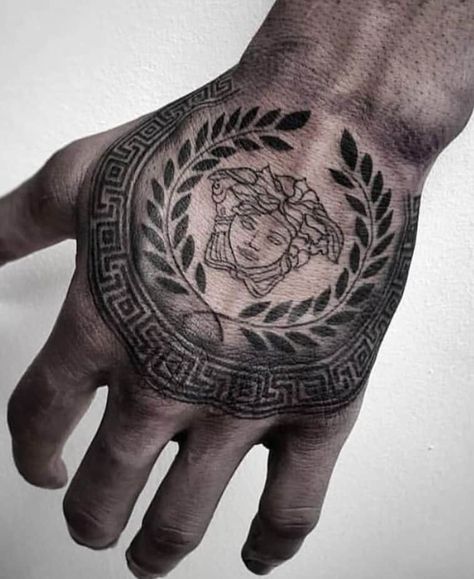 Medusa Tattoos: What Do They Symbolize? (With Images) Versace Tattoo, Tattoo Main, Herren Hand Tattoos, Medusa Tattoo Design, Flower Tattoo Shoulder, Neck Tattoo For Guys, Medusa Tattoo, Greek Tattoos, Hand Tattoos For Women