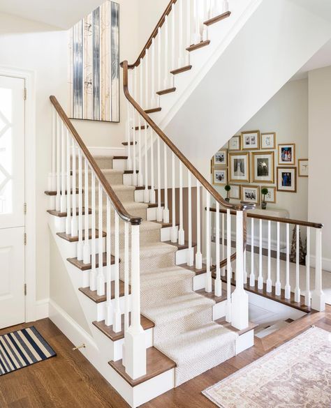 Jackson & LeRoy on Instagram: “Trim white balusters with natural wood handrails and stair treads maintain this homes timelessness.⁠⠀ ⁠⠀ interior design by…” White Balusters, Wooden Staircase Railing, Wood Railings For Stairs, Dutch Doors Exterior, Interior Stair Railing, Wood Handrail, White Stairs, Oak Stairs, Wood Railing