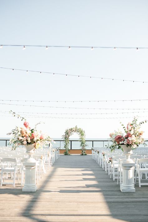 Wedding Ceremony Photos at Gurneys Montauk. Outside Wedding Ceremony Overlooking the Ocean on the Forward Deck at Gurney's Resort and Seawater Spa in Montauk, NY. Gurneys Montauk Wedding Photos. Beach Wedding Photos. Hamptons Wedding Photographer.     #montauk #hamptonsweddingphotographer #gurneysmontauk #nycweddingphotographer Hamptons Wedding Reception, Gurneys Montauk Wedding, Beach Deck Wedding, Deck Wedding Ceremony, Outside Wedding Ceremony, Deck Wedding, Gurneys Montauk, Outside Wedding Ceremonies, Montauk Wedding