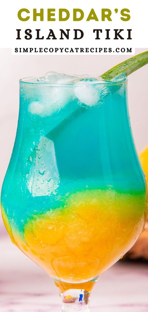 This copycat Island Tiki Cheddar's is a vibrant blue cocktail full of tropical flavors. It’s perfect for serving at backyard barbecues, luau parties, or enjoying on a hot day by the pool. Luau Cocktails, Tropical Drinks, Hawaiian Party Food, Cheddar Recipes, Layered Drinks, Glow In Dark Party, Tiki Cocktails, Tiki Drinks, Espresso Drinks