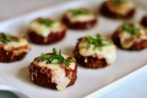 Petite discs of tender eggplant are delicately coated in a crisp breadcrumb crust, crowned with a dollop of rich marinara sauce and gooey mozzarella cheese. These mini eggplant parm appetizers are bite-sized wonders that encapsulate the essence of traditional eggplant parmesan in a single bite. Mini Eggplant, Eggplant Parm, Bite Size Appetizers, Roast Eggplant, Eggplant Parmesan, Individual Servings, Baked Brie, Chicken Cutlets, Baking Set