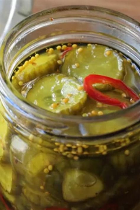 Chef John's Bread and Butter Pickles | "This was my first year trying to make pickles. This recipe is FANTASTIC! These are the most delicious bread and butter pickles I've ever had." #canningrecipes #picklingrecipes #canning #canningideas #pickling Cucumber Bread And Butter Pickles, Bread And Butter Pickles Canning, Spicy Bread And Butter Pickles, Bread And Butter Pickle Recipe, Pickles Homemade, Bread N Butter Pickle Recipe, Chef John Recipes, Refrigerator Pickle Recipes, Pickle Recipes Homemade