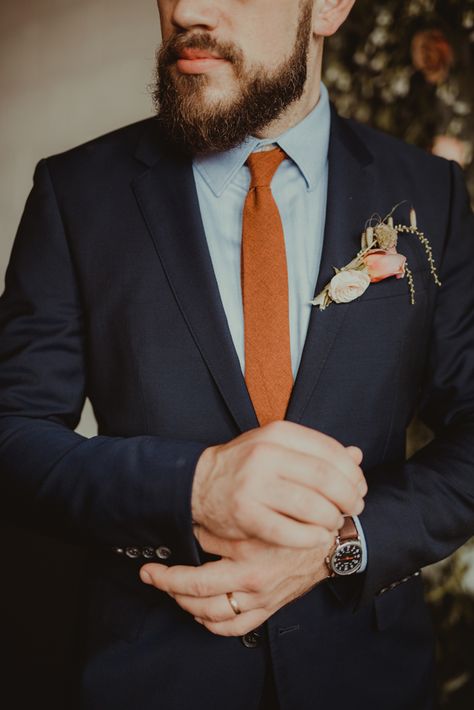 Black Suit With Rust Tie, Black Tux Orange Tie, Black Suit With Burnt Orange Tie, Navy Blue Tuxedo Wedding With Orange, Navy And Burnt Orange Groomsmen, Navy Blue And Burnt Orange Wedding Suit, Groomsmen Attire Fall Color Combos, Blue Suit Rust Tie, Navy Suit Orange Tie Wedding