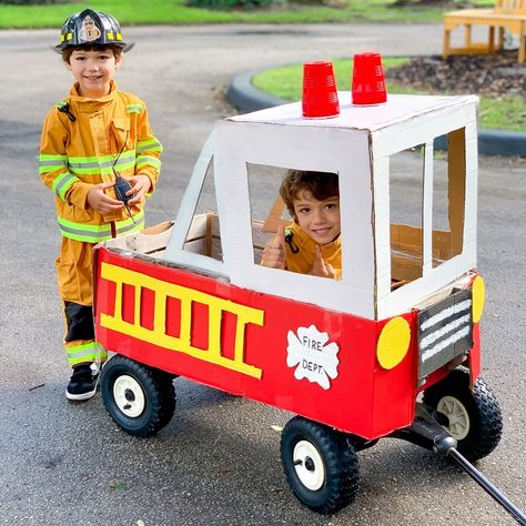 Diy Firefighter Costume, Diy Fireman Costumes, Fire Truck Costume, Teaching Colors To Toddlers, Diy Fire Truck, Diy Astronaut Costume, Wagon Halloween Costumes, Wagon Costume, Truck Costume