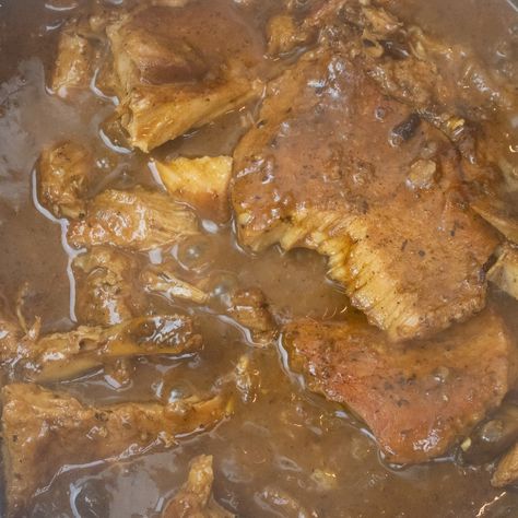 Cajun Pork Chops And Gravy, Beer Pork Chops, Smothered Pork Chops Southern, Southern Smothered Pork Chops Soul Food, Cajun Smothered Pork Chops, Authentic Southern Recipes, Smothered Pork Chops Skillet, Smothered Pork Steaks, Smothered Potatoes And Sausage