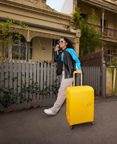 Walking right out Black Friday and into summer. The most appropriate suitcase is obvi our Curio 2 is yellow. Yellow Suitcase, American Tourister, Black Friday, Tourism, Walking, Collage, Yellow, Pins, Black