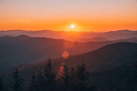 15 Best USA National Parks To Visit In The Spring - The Wandering Queen Smoky Mountain Hikes, Sunset In Mountains, Smokey Mountains Vacation, Mountains Vacation, Clingmans Dome, Laurel Falls, Channel Islands National Park, Sand Dunes National Park, Capitol Reef National Park