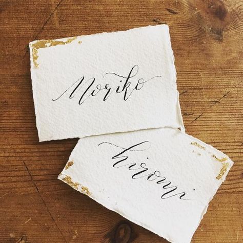 Gold Leaf Calligraphy Place Cards Gold Leaf Calligraphy, Leaf Calligraphy, Calligraphy Place Cards, Place Cards Wedding, Hand Calligraphy, Vintage Leather Handbag, Paper Place, Place Names, Wedding Places