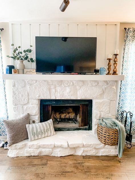 Beachy Fireplace Stone, White Stone Fireplace With White Mantle, White Stone Fireplace Decor, White Sparkle Stone Fireplace, White Faux Stone Fireplace, Beach Stone Fireplace, Large Rock Fireplace Makeover, Updated Stone Fireplace Ideas, Stone Fireplace Painted White