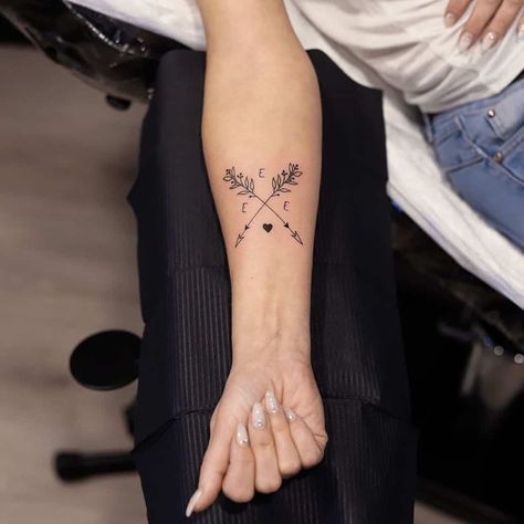 Arrow Tattoo With Name Initial Compass Initial Tattoo, Initial Tattoo On Shoulder, Cross Arrow Tattoos For Women, Daughter Initial Tattoo, Arrow Family Tattoo, Arrow Name Tattoos For Women, Initial Tattoo For Kids, 3 Initials Tattoo, Children’s Initials Tattoo