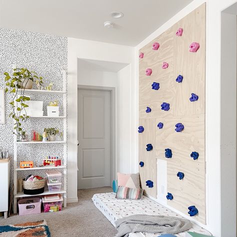 How to Build an Indoor Kids Rock Climbing Wall How To Make An Indoor Rock Wall, Playroom Ideas Rock Wall, Indoor Rock Climbing Playroom, How To Build Rock Walls, Rock Climbing Playroom, Home Rock Wall Indoor Climbing, Bedroom With Climbing Wall, Rock Climbing Wall Basement, Diy Indoor Rock Climbing Wall