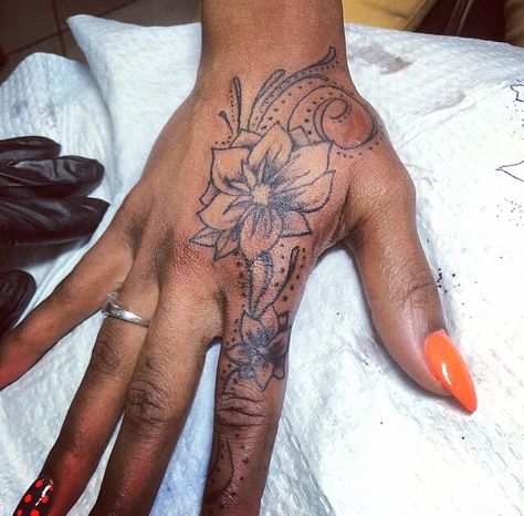 Lilly Hand Tattoos For Women, Female Hand Tattoos Black Women, Lilly Hand Tattoo, Pretty Hand Tattoos For Women Unique, Lotus Flower Hand Tattoos For Women, Samoan Hand Tattoo Women, Samoan Hand Tattoo, Female Hand Tattoos For Women, Hand Flower Tattoos