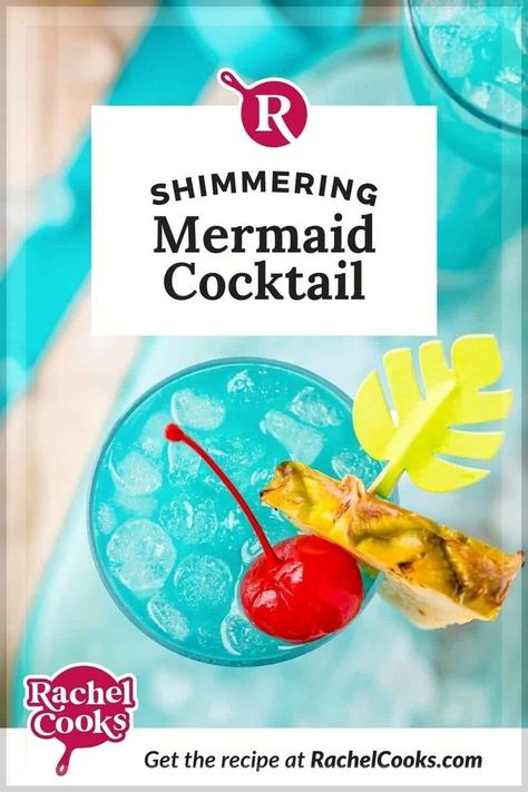 So pretty and so sweetly delicious, this Mermaid Lemonade (with a cotton candy twist!)! is the perfect cocktail for summer parties and special occasions. It's easy to make one drink or a pitcher full! This recipe starts with rum, pineapple juice, orange juice, lemonade, and blue Curaçao and then a cotton candy “bomb” filled with stunning turquoise luster dust is dropped into the glass, adding sweetness, shimmer and an extra pop of blue color. Fun, festive and so good! Mamma Mia Mocktails, Kid Friendly Mocktails, Mermaid Lemonade, Blue Curacao Drinks, Summer Drink Menu, Mermaid Drink, Fruity Cocktail, Disney Dinner, Blue Cotton Candy