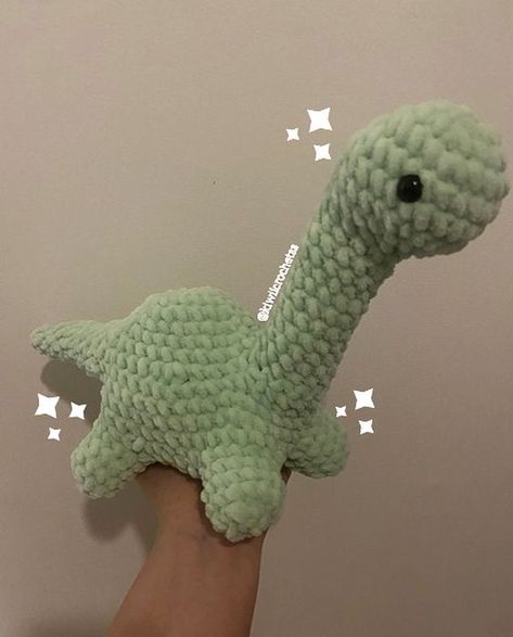 Mint Green Brachiosaurus Crochet toys free patterns easy #crochettoysfreepatternseasy #crochet #crochettoy #crochetpattern #crochetpatterns 4.210 Crochet Plushies Dinosaur, Aesthetic Amigurumi Free Pattern, Brachiosaurus Crochet Pattern, How To Crochet Dinosaur, Green Crochet Animals, Crochet Animals Cute, Crochet Brachiosaurus, Crochet Stuff Animals, Cute Crochet Stuffed Animals