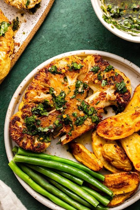 Cauliflower Steaks with Chimichurri - From My Bowl Cauliflower Steak With Tahini, Cauliflower Steak Recipes, November Recipes, Cauliflower Steaks Recipes, Steak With Chimichurri Sauce, Cauliflower Steak, Roasted Cauliflower Steaks, Paleo Cauliflower, Vegan Steak