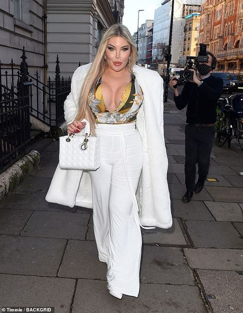 Busty: Jessica Alves set pulses racing as she slipped into a plunging top for a shopping trip in London on Thursday Jessica Alves, Andre The Giant, Productive Day, Shopping Trip, Top Pattern, Cloth Bags, Put On, In London, Two Piece Pant Set