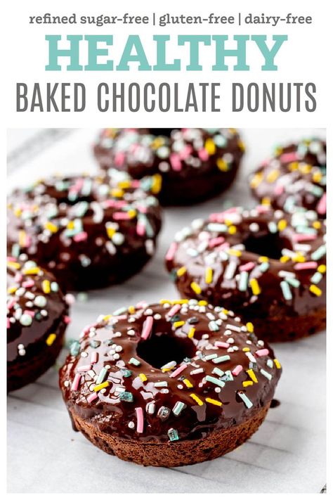 These healthy chocolate baked donuts are the ultimate rich, yet healthier treat! Baked rather than fried, these fluffy glazed donuts are made from scratch with oat flour and almond flour for a nutrient-packed sweet treat. They require no yeast and are super easy to make for a fun dessert, snack, or breakfast! {Gluten-free & dairy-free-friendly} Healthy Chocolate Donuts Baked, Healthy Breakfast Donut Recipe, Almond Flour Baked Donut Recipe, Healthy Baked Doughnut Recipes, Black Bean Donut Recipe, Oat Flour Donut Recipe, Healthy Mini Donut Recipe, Healthy Baked Donut Recipes, Homemade Baked Donuts Recipe