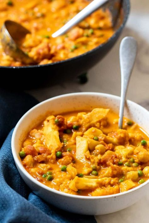 Cauliflower Chickpea Curry - Vanilla Bean Cuisine vegetarian recipes Cauliflower Chickpea Curry, Chickpeas And Potatoes, Cauliflower And Chickpea Curry, Cauliflower Chickpea, Veg Gravy, Indian Vegetarian Dishes, Chickpea Curry Recipe, Cauliflower Curry, Coconut Milk Curry