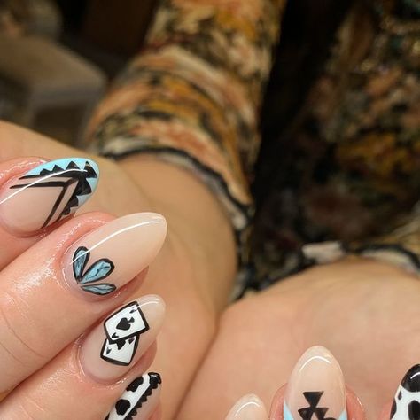 Marissas.nails on Instagram: "fun western set 🖤  . . . . . #almondnailshape #westernnailart #handpaintednailart #luminaryclarity #tammytaylorglassslipper #tammytaylorbondit #filesbylesswhiteout #cowprintnails #youngnailscourse" Western Nails With Turquoise, Gel Western Nails, Camp Nails Ideas, Fall Nail Designs Western, Cow Skull Nail Art, Western Spooky Nails, Fun Western Nails, Western Chic Nails, White Nails Western