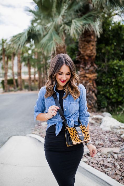 Black fitted midi dress with a chambray shirt tied at the front and a leopard print handbag Denim Shirt Outfit Summer, Denim Shirt Outfits, Shirt Over Dress Outfit, Shirt Over Dress, Chambray Shirt Outfits, Black Fitted Midi Dress, Kemeja Denim, Denim Shirt Outfit, Midi Dress Outfit