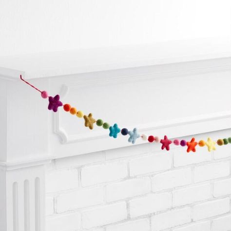 Felted Wool Star and Pom Pom Garland | World Market Pom Garland, Christmas Mantel Decorations, Unique Christmas Decorations, Star Garland, Holiday Garlands, Pom Pom Garland, Felt Garland, Rainbow Decorations, Wreaths & Garlands