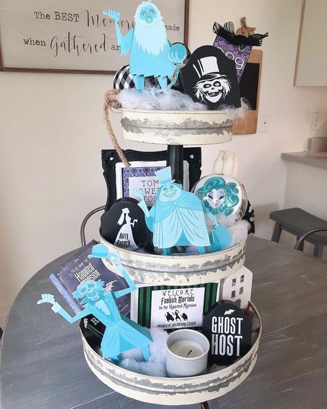 🌸Veronica Zamora on Instagram: “Halloween in our home is decorated in Disney style. Crafted a couple of elements to our tier tray using target items like tomb stones,…” Haunted Mansion Cake Disney, Haunted Mansion Tiered Tray, Funko Pop Display Ideas, Tomb Stones, Manifesting Magic, Goth House, Disney Halloween Decorations, Magic Board, Disney House