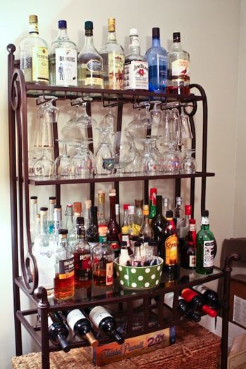 Baker's Rack Bar.. Not sure how I feel about this being out all day, everyday, but when entertaining, it would be neat to have in place of an all out bar setup Modern Bakers Rack, Baker's Rack Ideas, Bakers Rack Decorating, Diy Arbor, Bakers Racks, Baker's Rack, Liquor Bar, Bakers Rack, Wine Bars