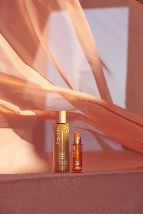 Golden hour means it’s time to apply our Golden Tan Maximizer After Sun Body Oil and After Sun Face Serum ✨ End a day spent in the sunshine well, repair your sun-exposed and soothe it with the natural shea butter and calendula oil 🌼 contained in these new clean formulas. They boost your tan with buriti oil, for golden radiance that lasts for up to one month. Golden Hour Product Photography, Skincare Shoot, Tan Oil, Beauty Campaign, Buriti Oil, Sun Aesthetic, Sunkissed Skin, Golden Hour Photography, Sunscreen Stick