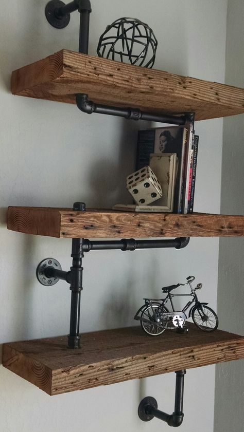 Floating Industrial Shelves, Industrial Wooden Shelves, Wooden Pipe Shelves, Rustic Industrial Shelves, Black And Wood Industrial Bedroom, Pipe And Wood Shelves Bathroom, Staggered Industrial Pipe Shelves, Pipe Furniture Wall Shelves, Mens Bedroom Shelving Ideas